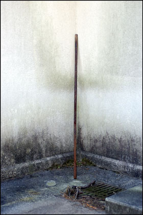 Photograph of Steel Pipe in Corner by Ann Clancy